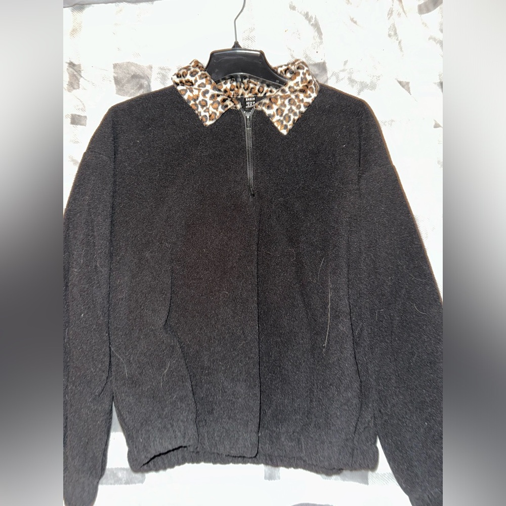 Black half-zip sweater